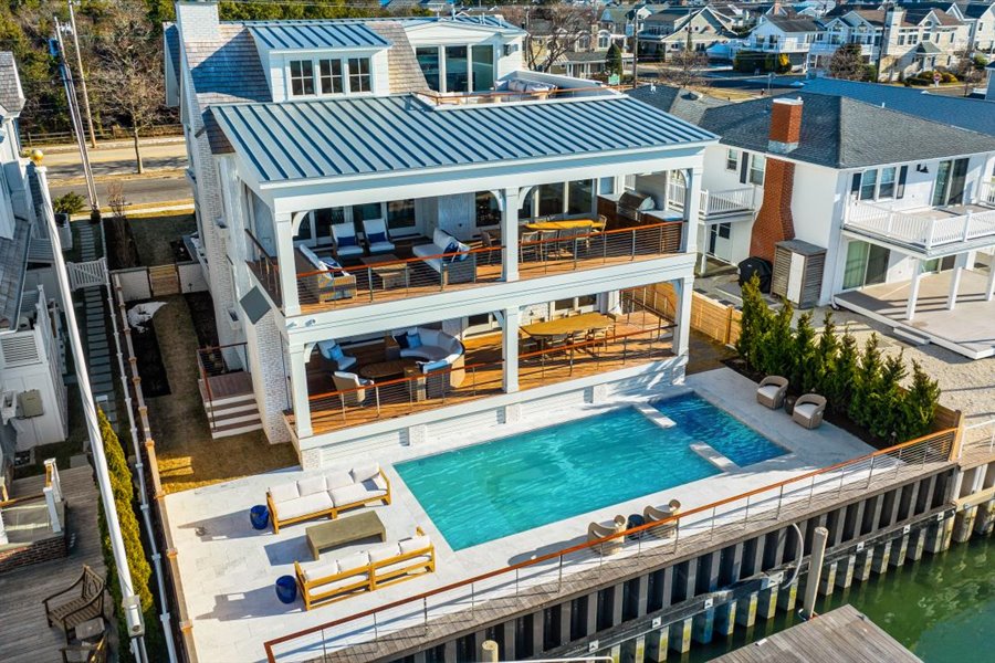 exterior rear showing pool and spa