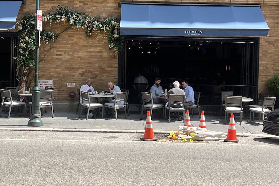 Customers enjoying outdoor dining at Philadelphia restaurant Devon Seafood Grill on August 21, 2024 (Photo by Laura Swartz)